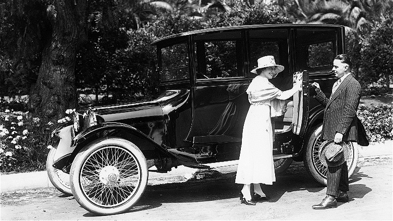 Couple and Model T, 1916