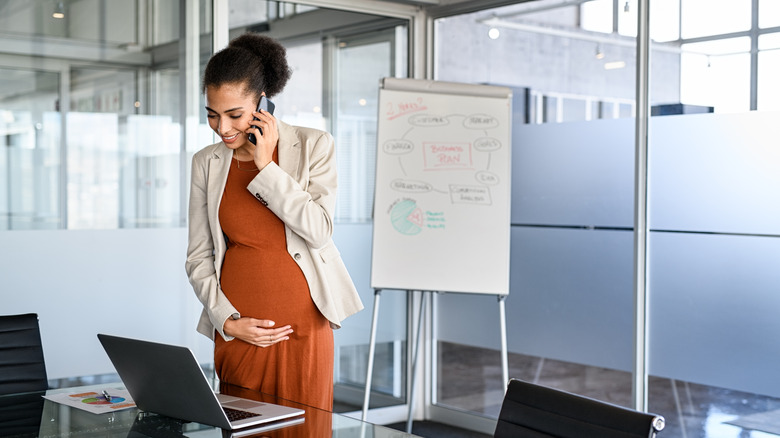 A pregnant woman at work