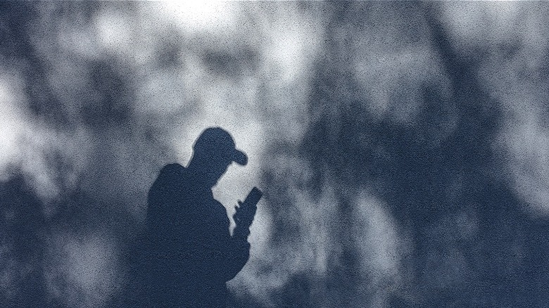 Silhouette of man on mobile app