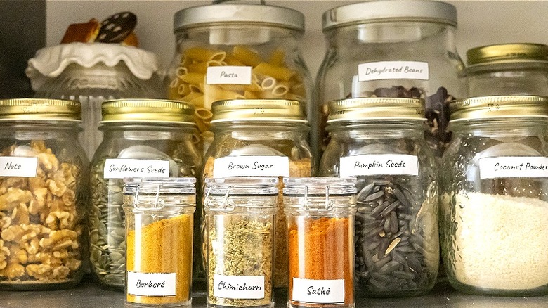 Labeled jars in pantry