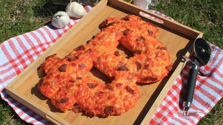 pizza shaped like Bitcoin symbol