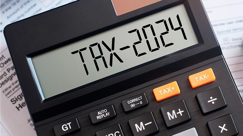 Calculator with "TAX-2024" in display