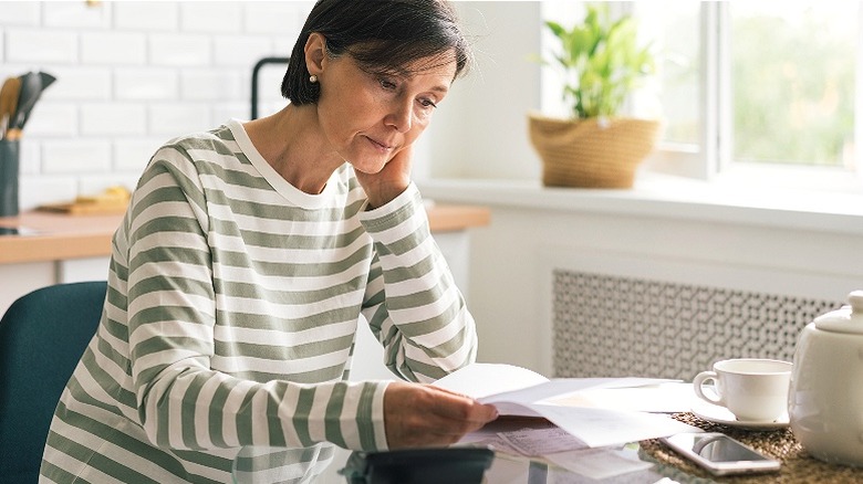 Woman looking over financials