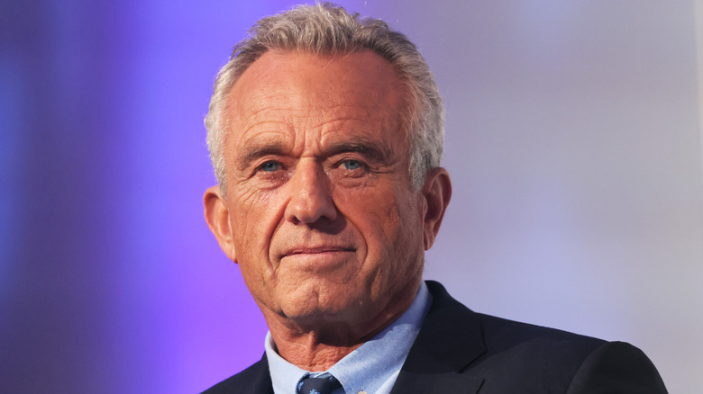 A close-up shot of Robert F. Kennedy Jr grinning