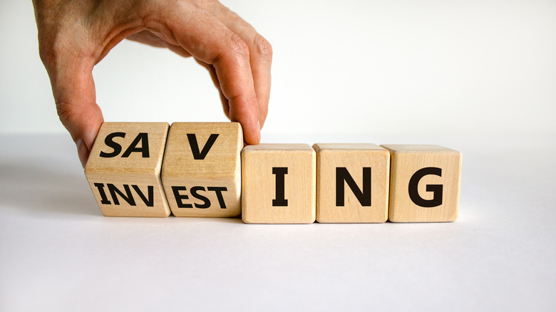 Blocks depicting saving and investing