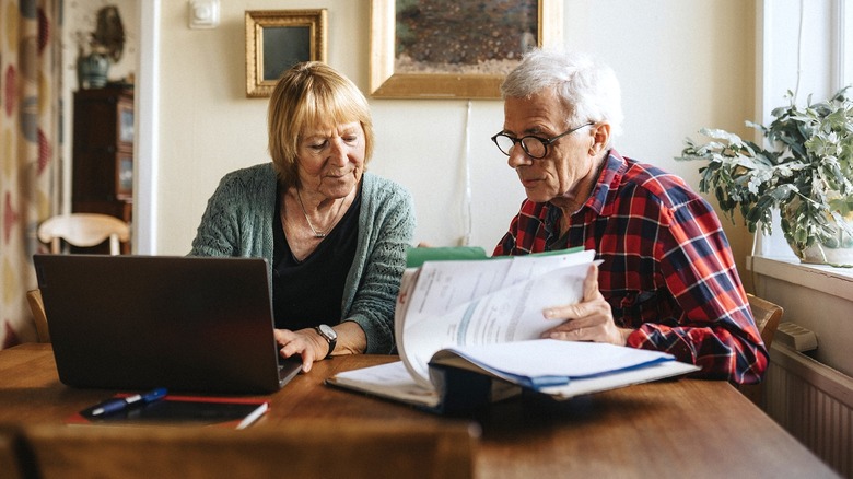 Retired couple going over numbers