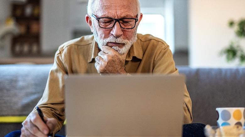 Retiree working on laptop