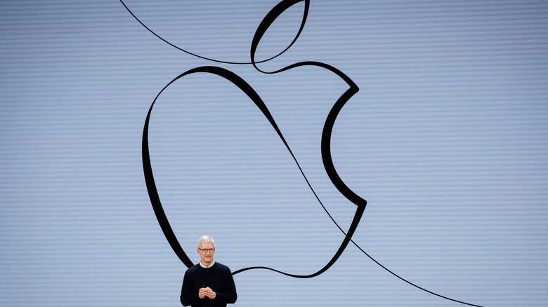 Tim Cook and an Apple logo