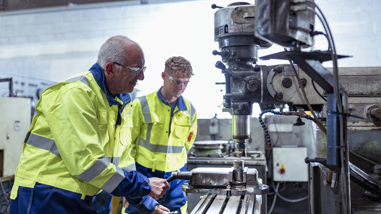 A senior working in factory