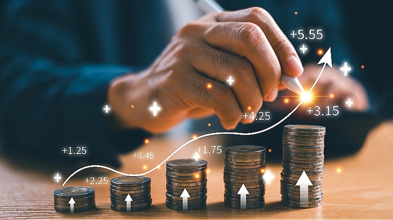 Compounding interest concept with coins