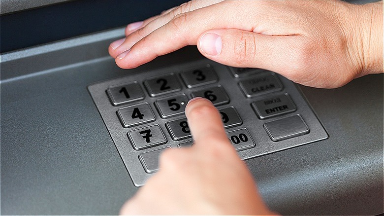 Person shielding ATM keypad