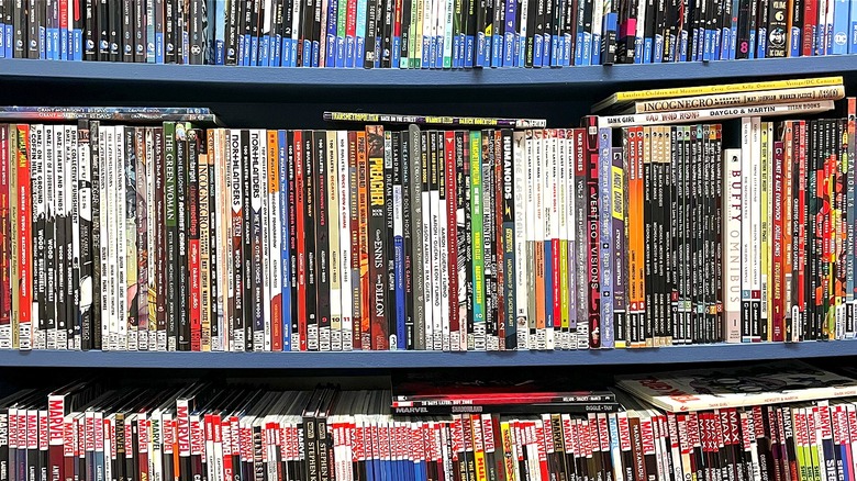 Comic books fill bookshelf