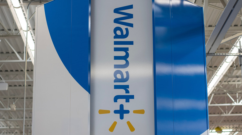 a Walmart+ sign