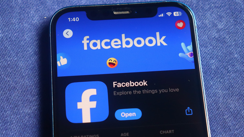 Facebook logo displayed on iPhone screen