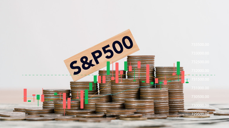 Rising piles of coins with S&P 500 stock index sign