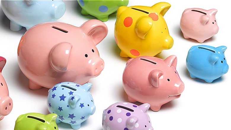 Multiple piggy banks of different sizes and designs