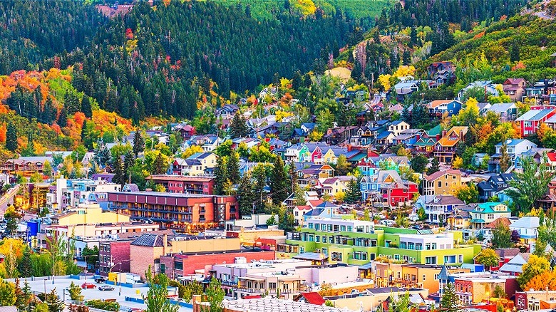 Aerial view of colorful buildings with tree background in Park City, Utah