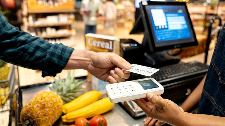 Paying groceries with credit card
