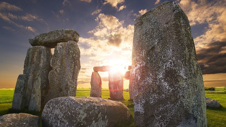 Late-day sun breaks through Stonehenge