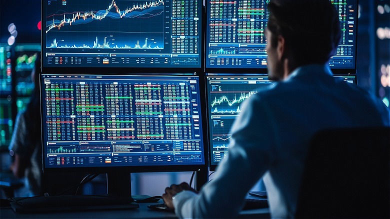 Day trader scouring market data