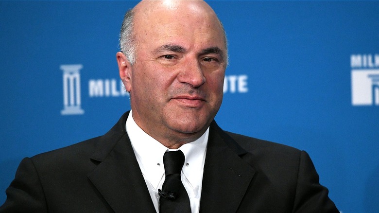 Kevin O'Leary smiling at a Milken Institute event