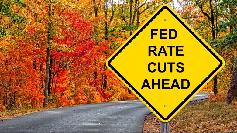 Fed rate cuts road sign