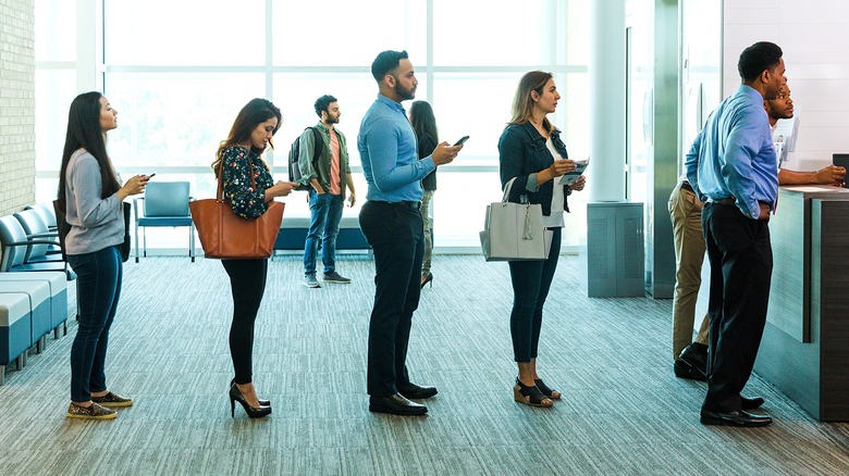 People waiting in bank line