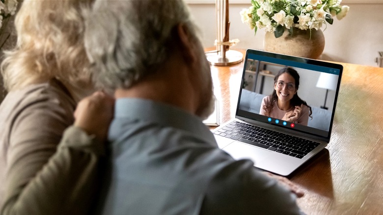 Parents and daughter video call