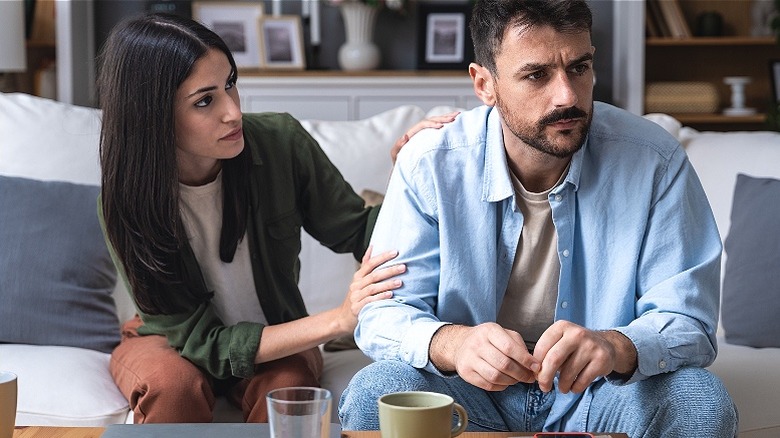 Person turning away from conversation