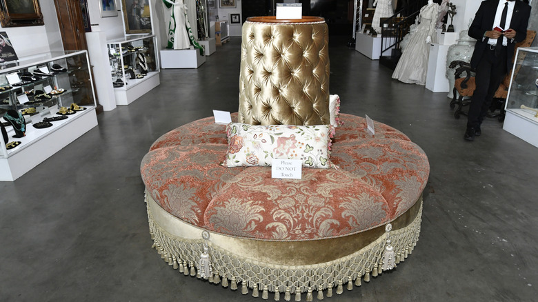 Fancy furniture on the floor of a collectible shop