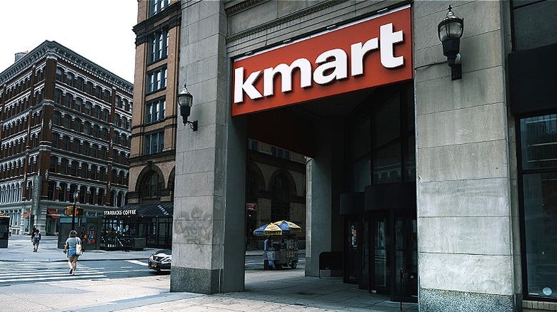 Sidewalk in front Kmart storefront