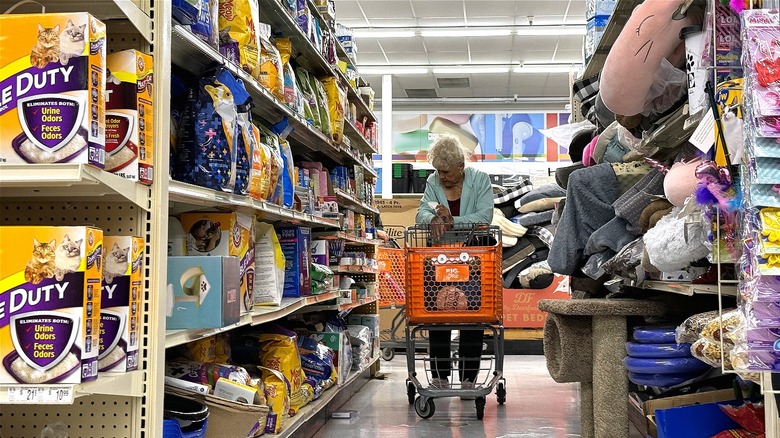 shopping cart in grocery aisle