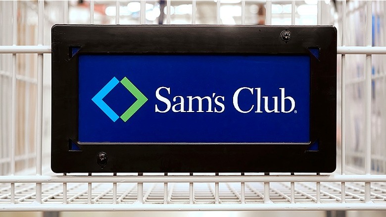 Close-up of a shopping cart emblazoned with a Sam's Club logo