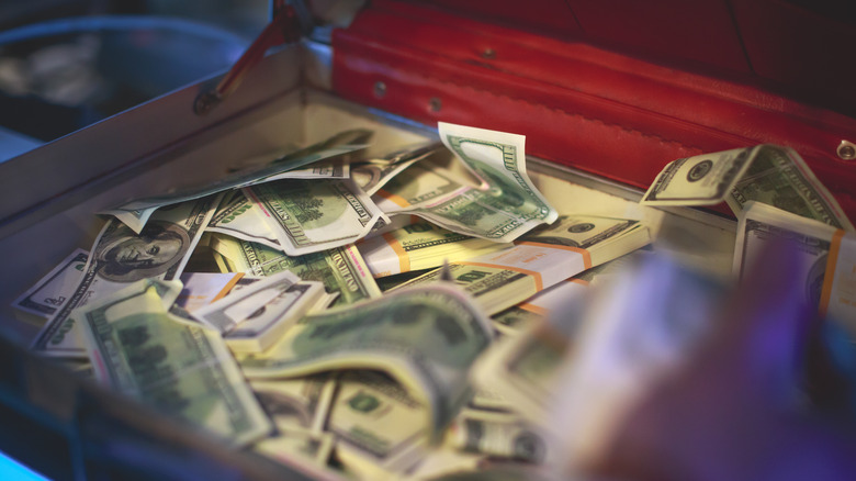 Close up of a briefcase full of money