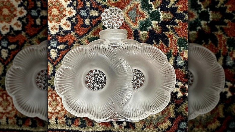 Vintage Lalique perfume bottle designed as overlapping flowers