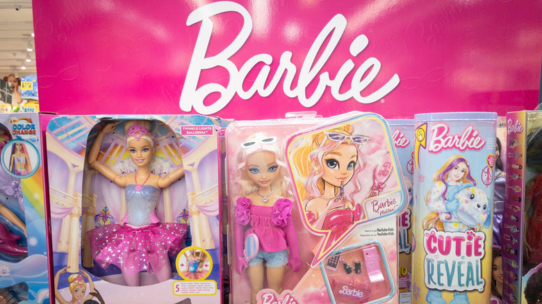 Close-up of Barbie dolls in packages