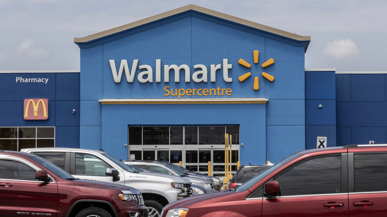 The exterior of a Walmart and parking lot