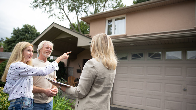 A realtor showing a home