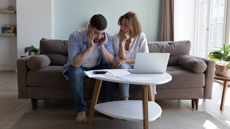 A stressed Milennial couple