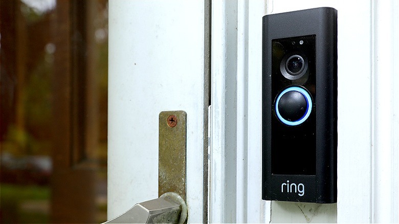 Ring doorbell on white door