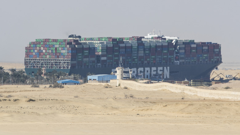 Evergreen container ship, the Ever Given, run aground in Egypt's sandy Suez Canal.