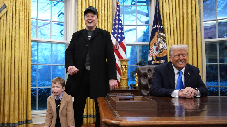 Elon Musk and the president in the oval office