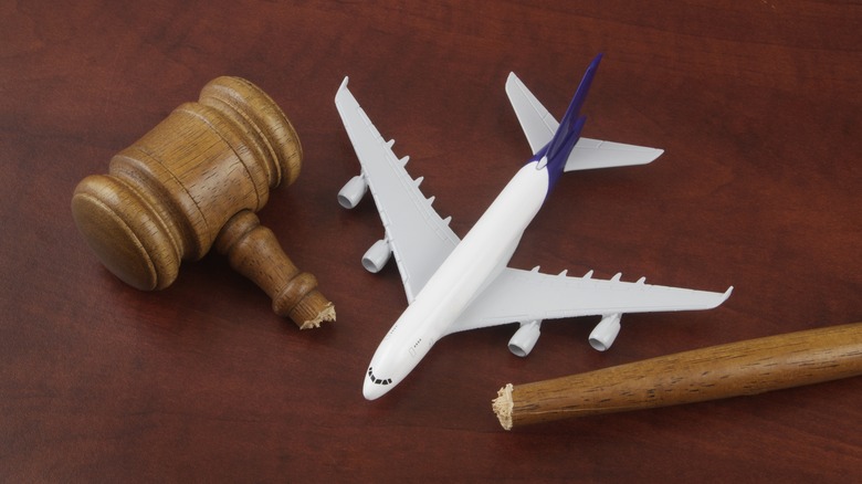 gavel with model airplane