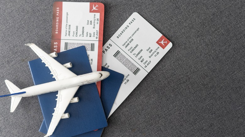 an airplane and boarding passes
