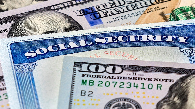 Social Security card, $100 bills