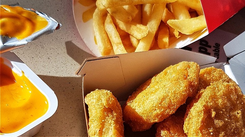 Close-up of McDonald's fries, nuggets, and an opened dipping sauce