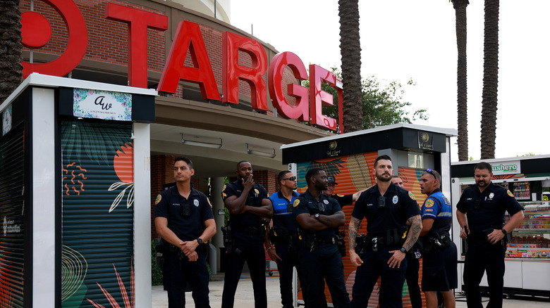 Police watching protestors outside a Target location