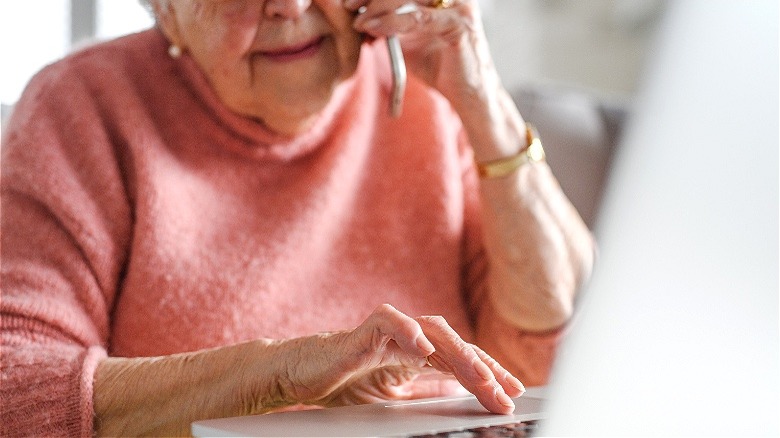 Elderly woman on the computer