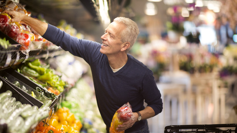 Man shopping in a grocery store.