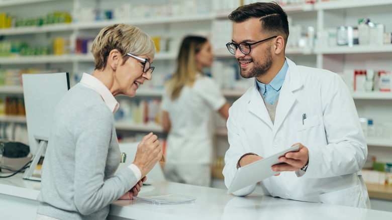 pharmacist talking with patient